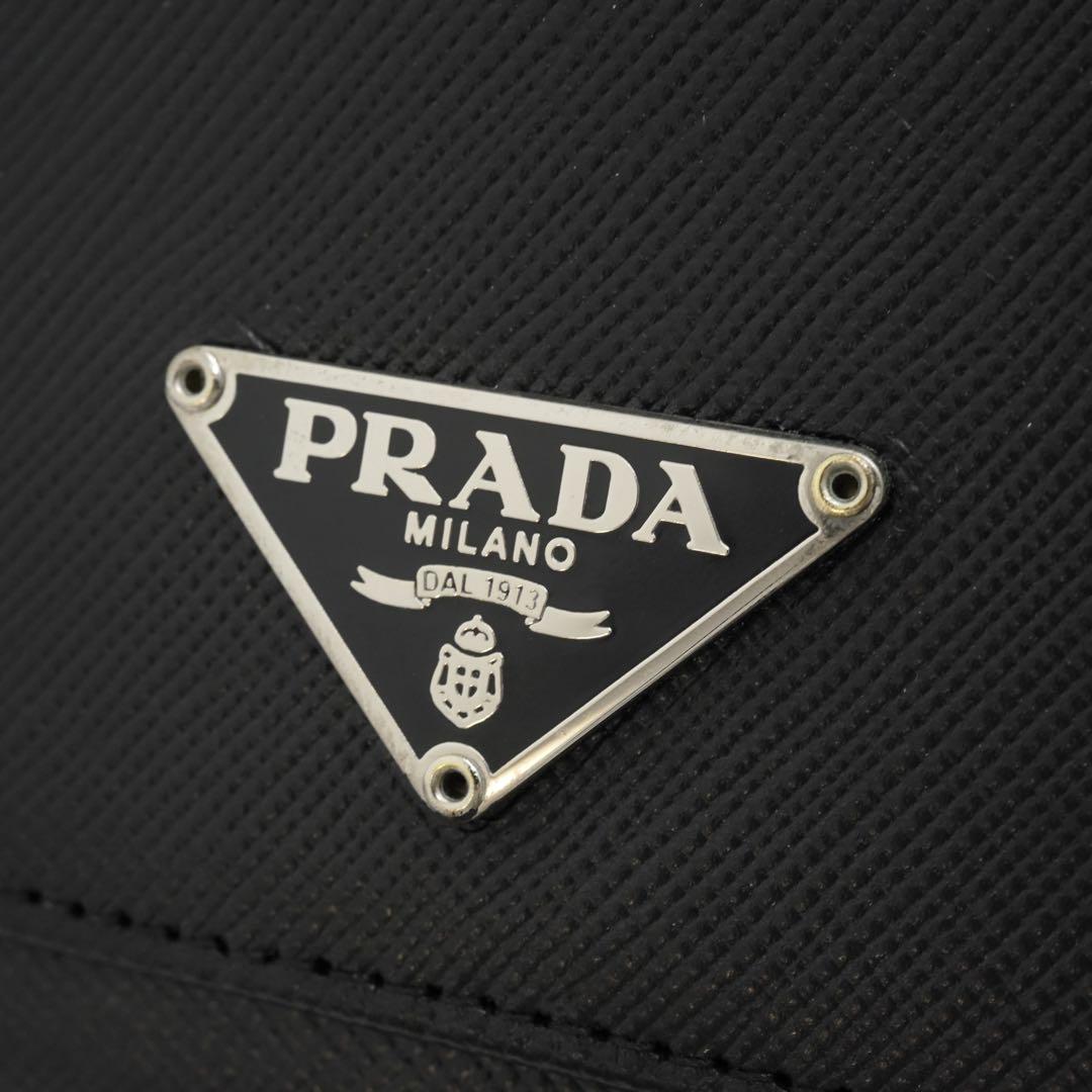 ✨未使用展示品・箱保証書付き✨ PRADA 長財布 三角プレート