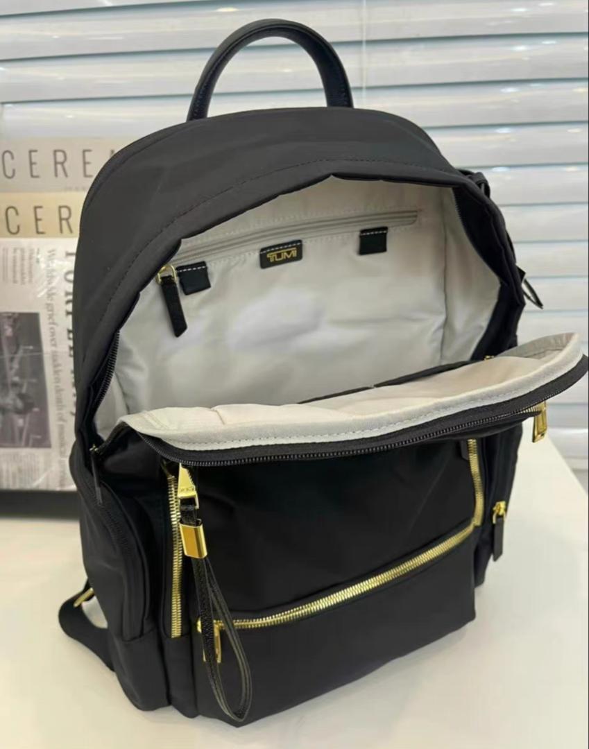 TUMI セリーナ ゴールドジッパー - メルカリ