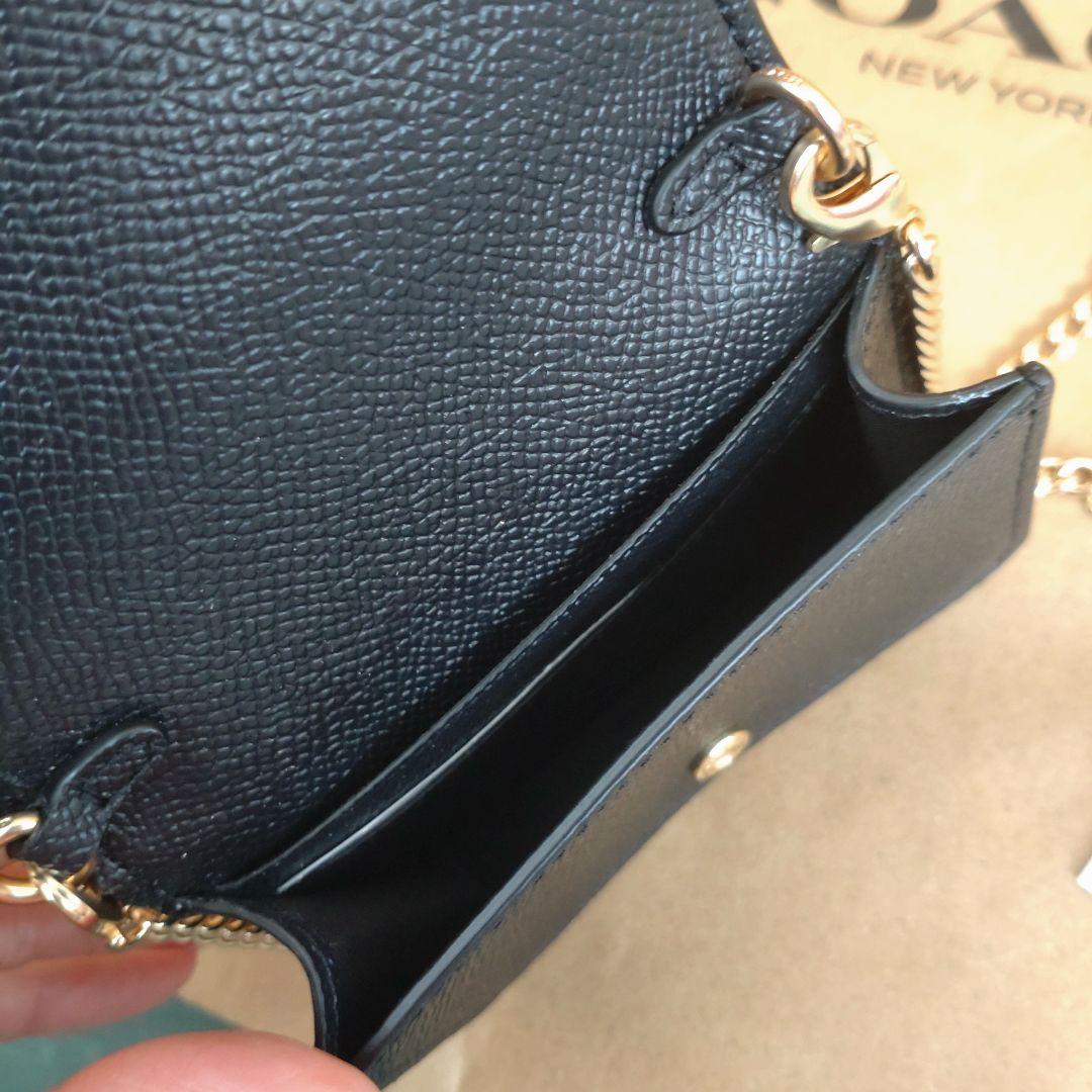 COACH ブラックレザーポーチ チェーンストラップ付き - メルカリ