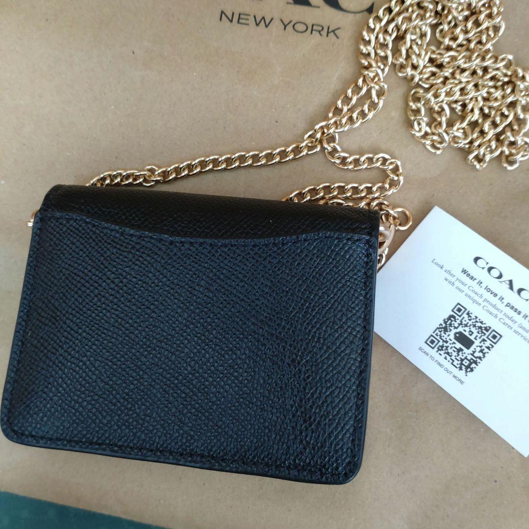 COACH ブラックレザーポーチ チェーンストラップ付き - メルカリ