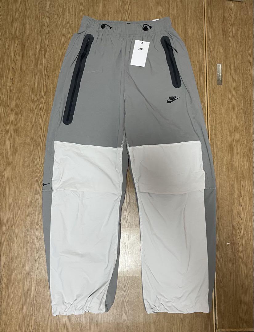 新品未使用　ナイキテックメンズ ウーブンオープンヘムパンツ　Lサイズパンツ