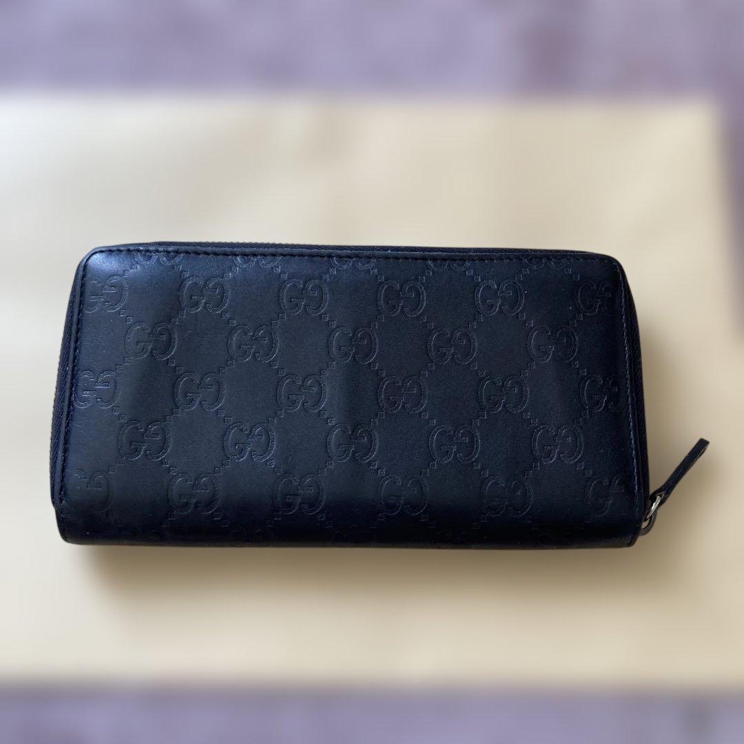 グッチ 長財布 ラウンドファスナー しま目立った傷や汚れなし