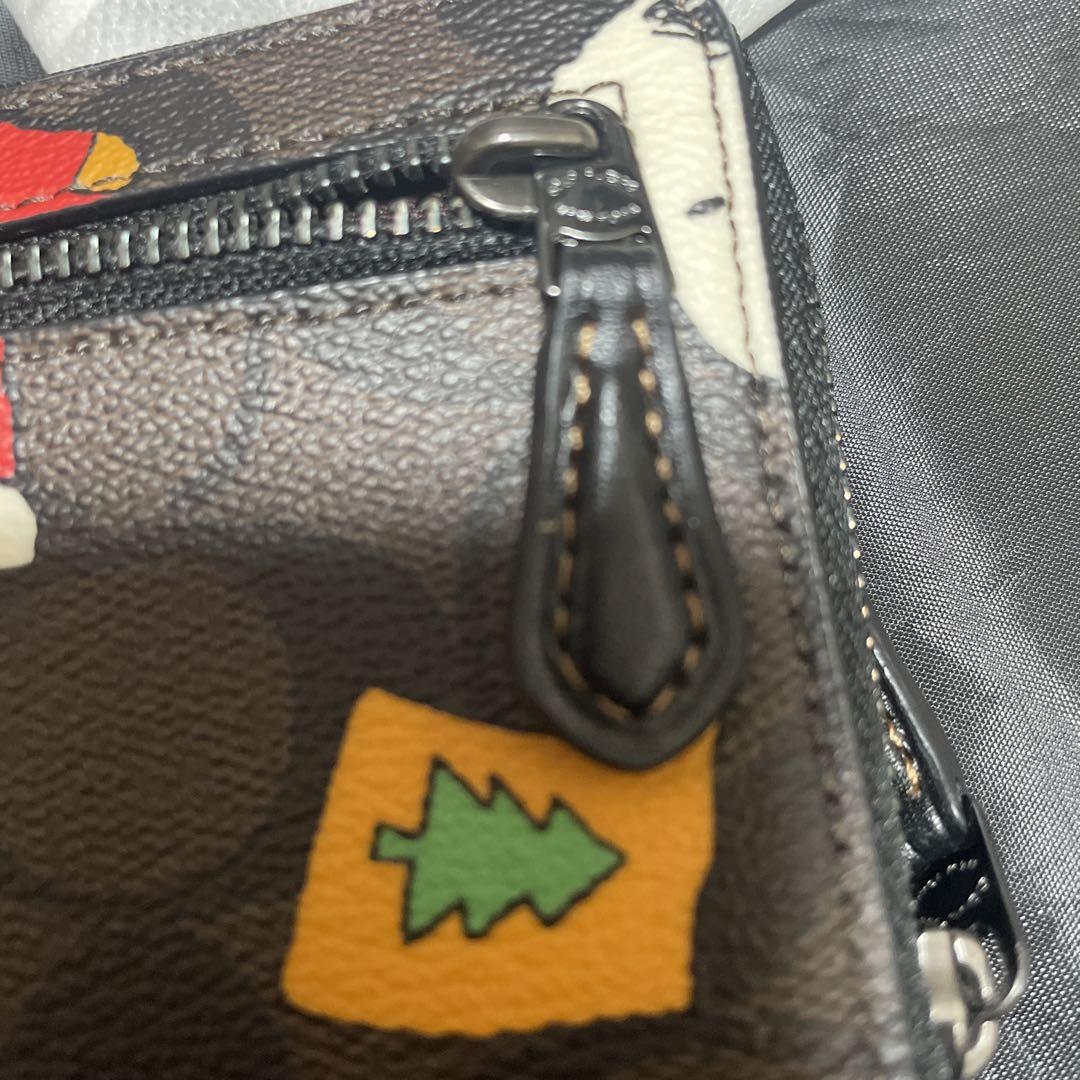COACH X PEANUTS】ジップ アラウンド ウォレットスヌーピー