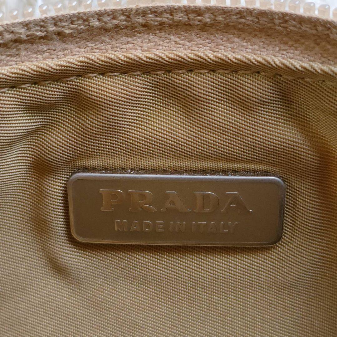 PRADA ポーチ　アクセサリーポーチ　ナイロン　ベージュ系　ロゴ　三角プレート PRADA プラダ アクセサリーポーチ ナイロン 三角ロゴプレート