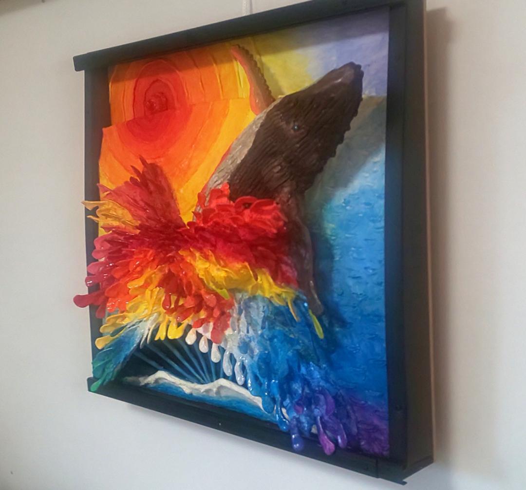 朝日のクジラのジャンプ