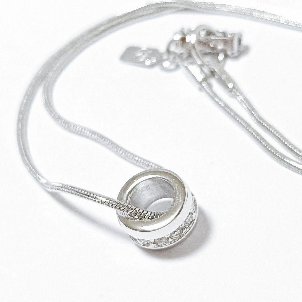 スワロフスキー　シルバーリング　ネックレス SWAROVSKI スワロフスキー シルバー 二重リングペンダント