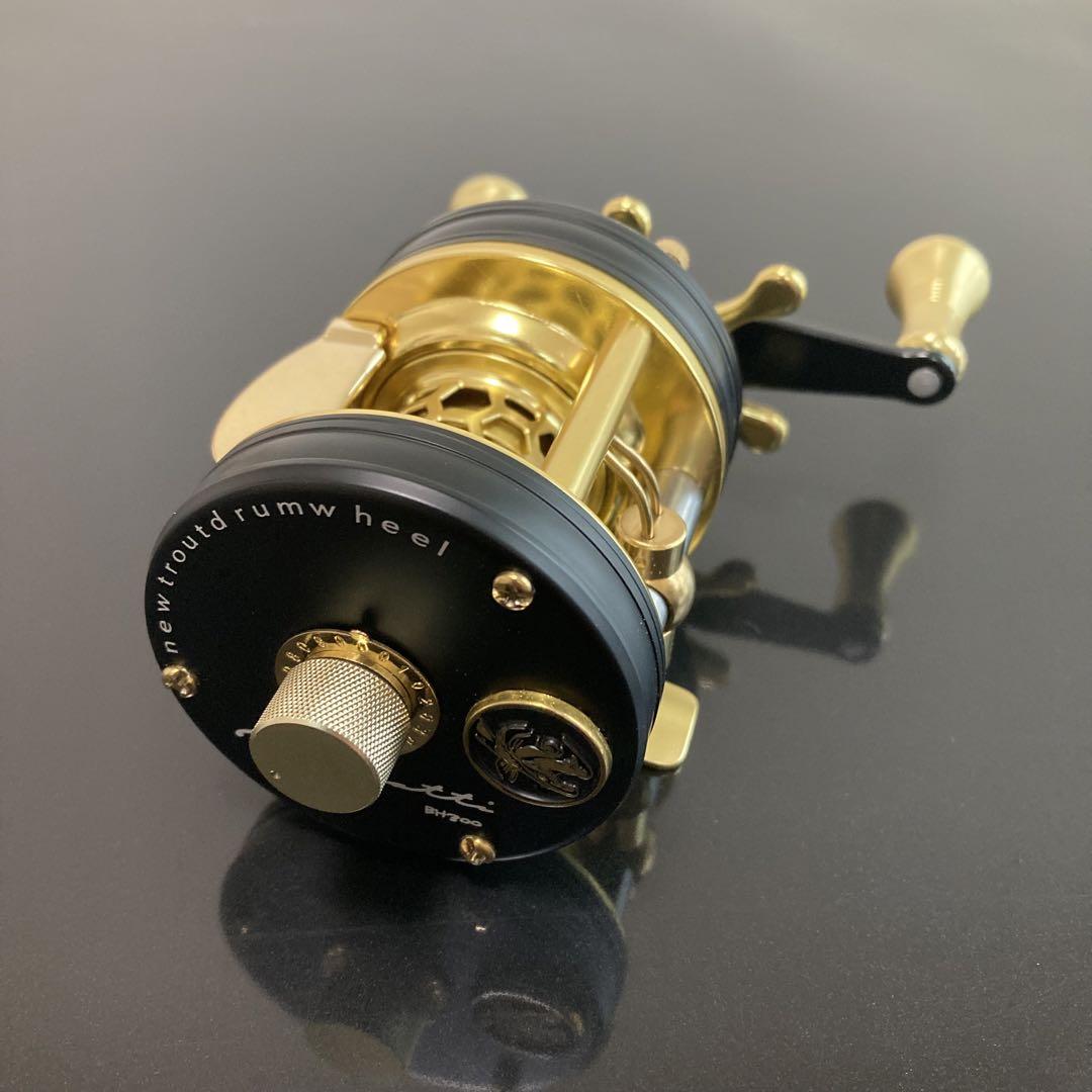 新品】渓流ベイトリール 丸型リール トラウト用 ゴールド／ブラック