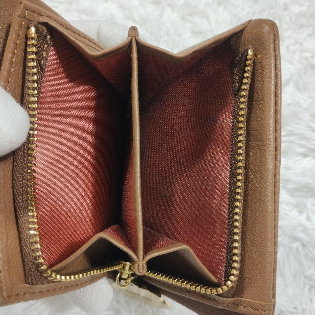 アナスイ》新品 花モチーフチャーム付 立体ロゴ やわらかレザー