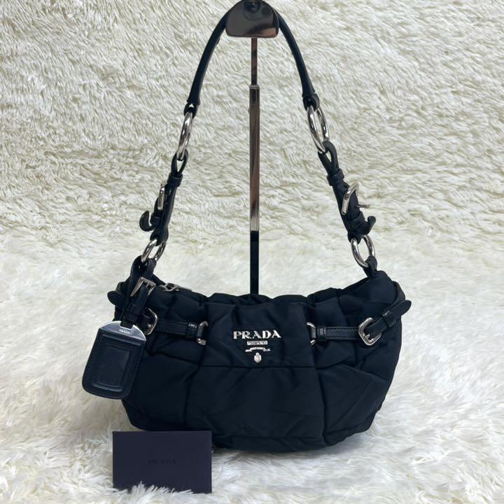 ✨極美品✨極希少✨プラダ 2way アクセサリーポーチ ネームタグ 総柄