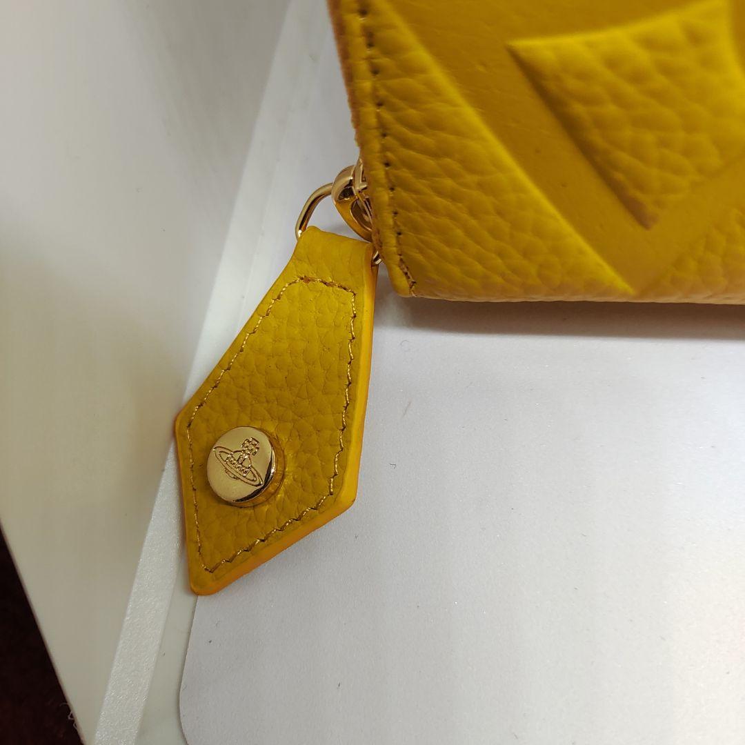 311黄色値下げ！ヴィヴィアンウエストウッド長財布 アウトレット品 かわいい