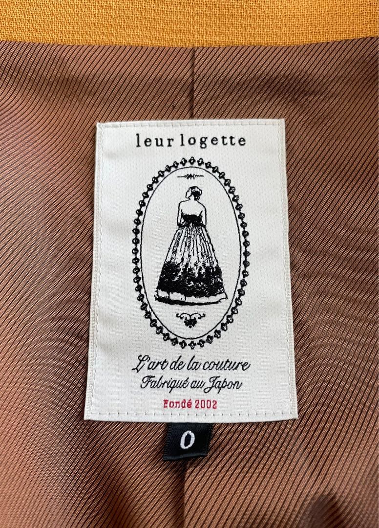 マスタード色のウールトリプルクロスコートM leur