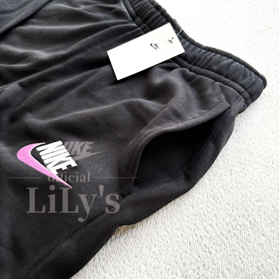 2新品　NIKE上下セットアップ　Ｍサイズ　黒✖️紫　スウォッシュ　ナイキ