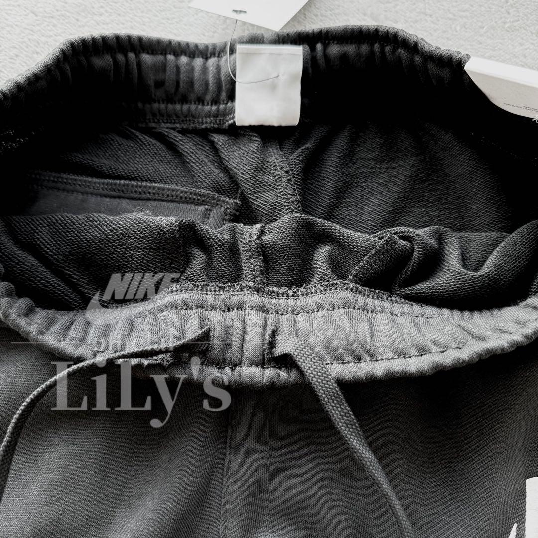 2新品　NIKE上下セットアップ　Ｍサイズ　黒✖️紫　スウォッシュ　ナイキ