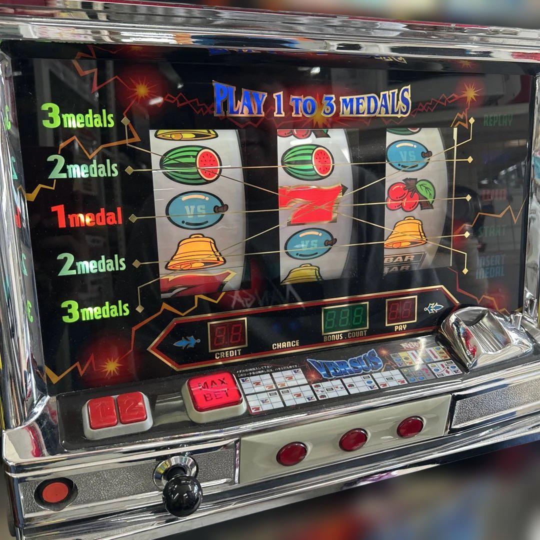 VERSUS バーサス スロット 4号機 メダル付き