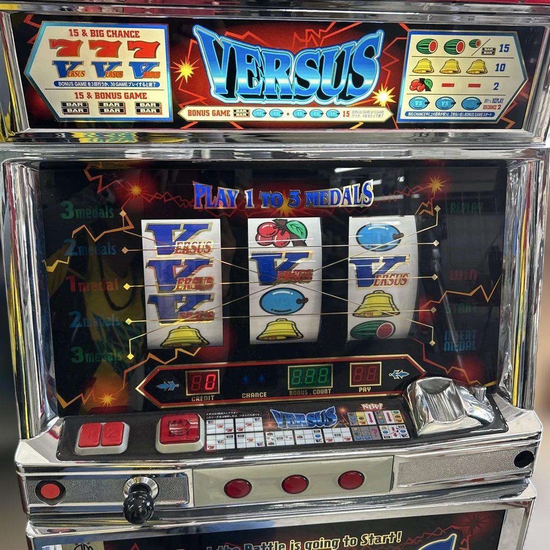 VERSUS バーサス スロット 4号機 メダル付き