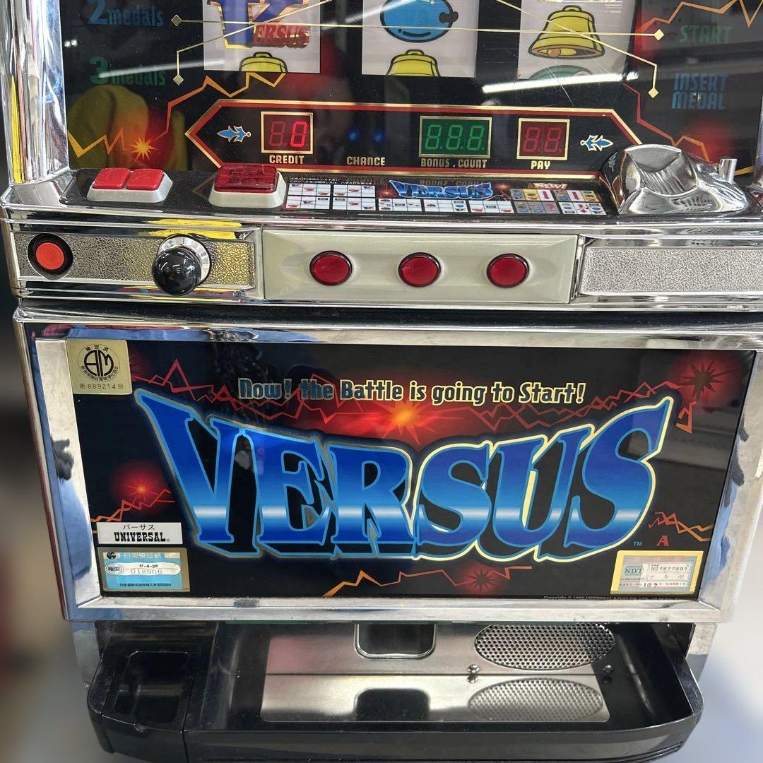 VERSUS バーサス スロット 4号機 メダル付き