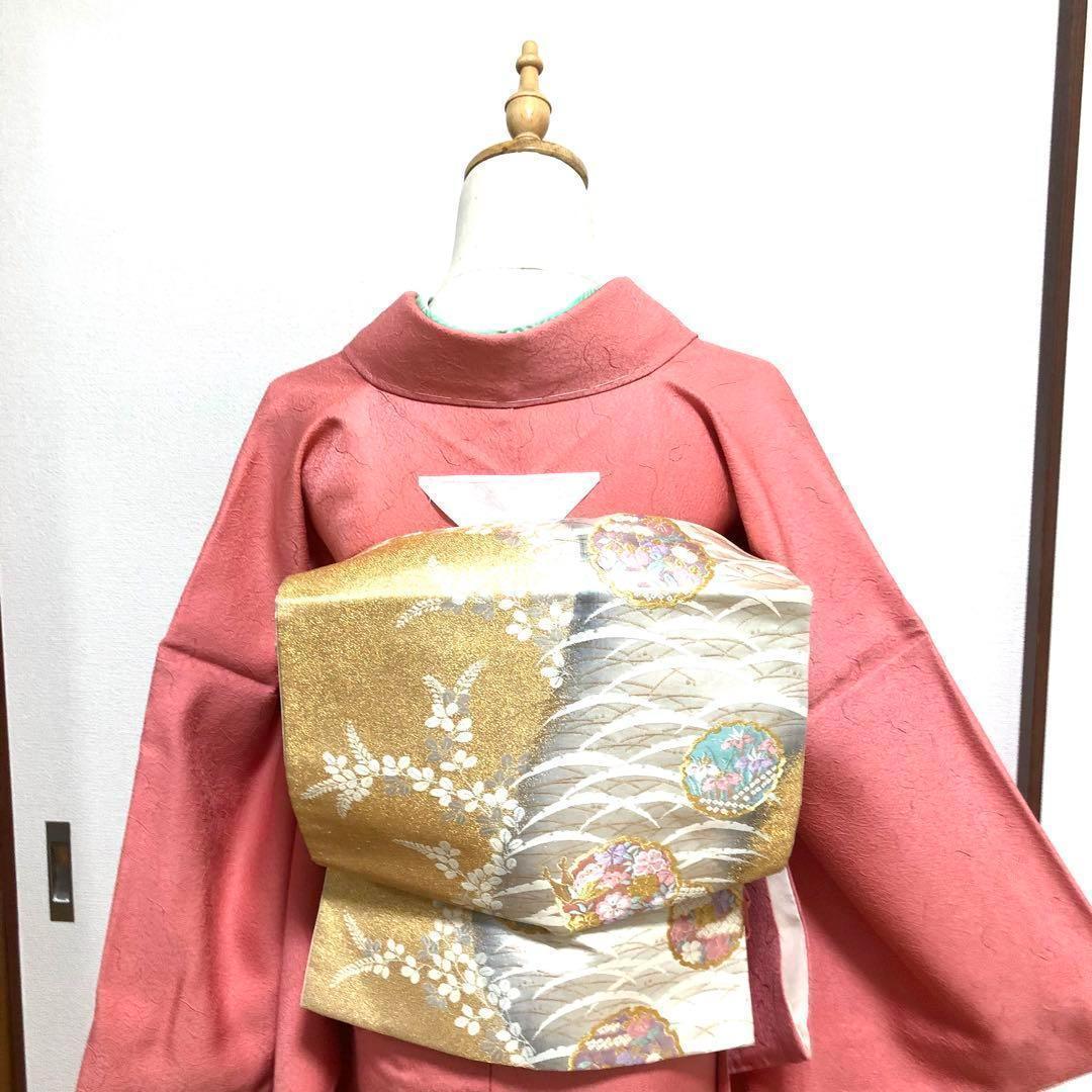 未使用 正絹 しつけ付き 一つ紋色無地 共八掛 珊瑚色