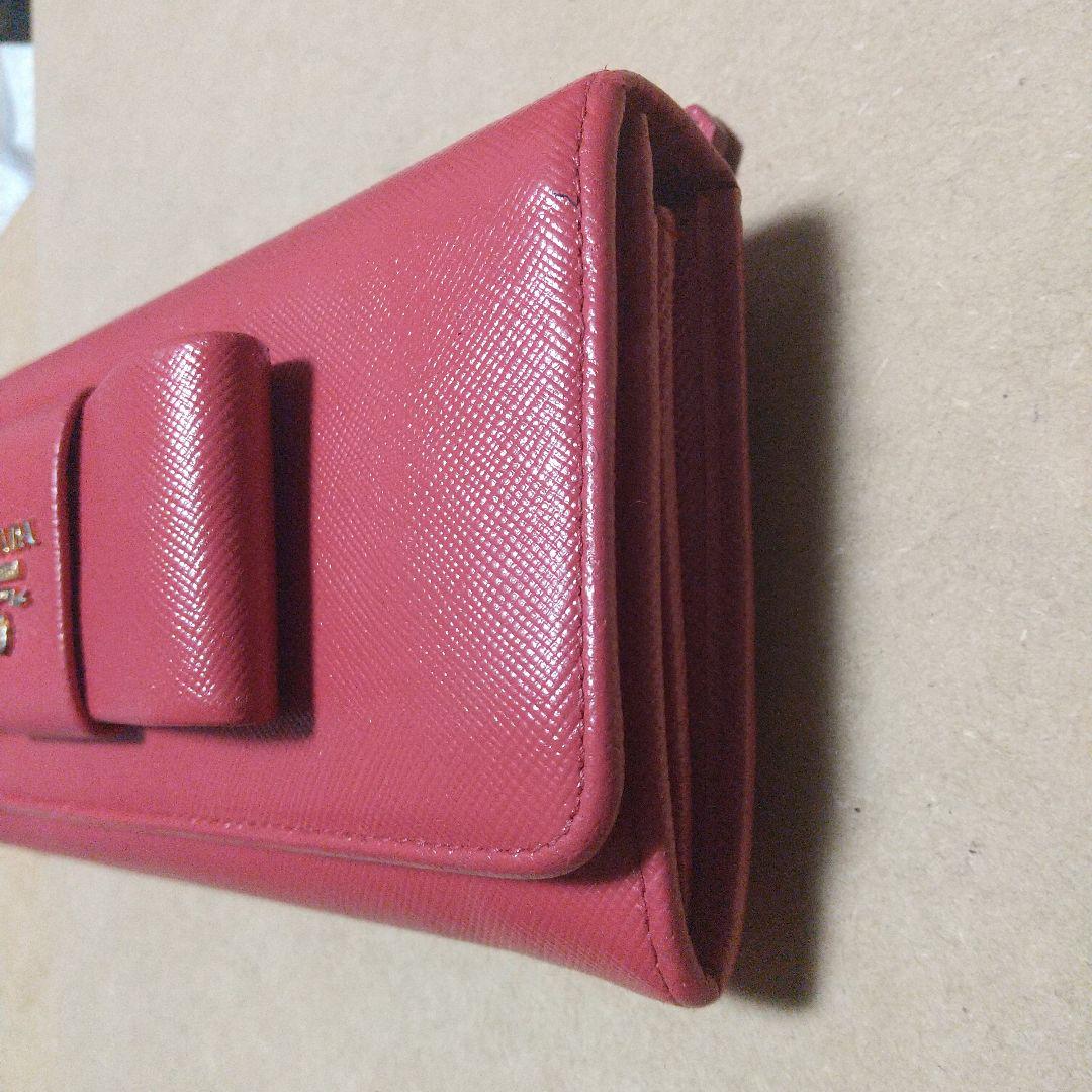 PRADA リボン付き長財布レッド