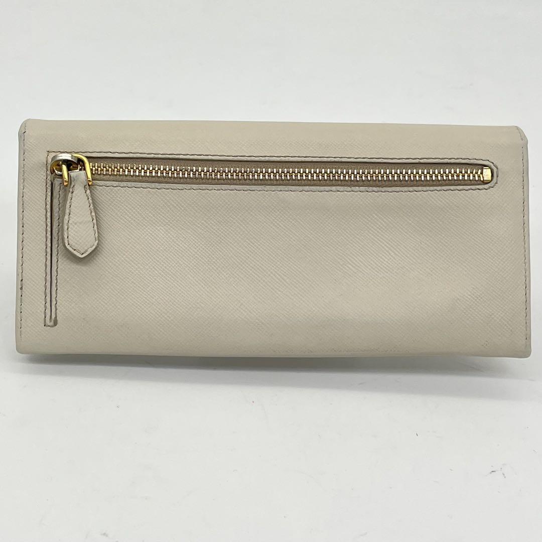 PRADA 長財布 フラップウォレット 三角プレート サフィアーノレザー 白