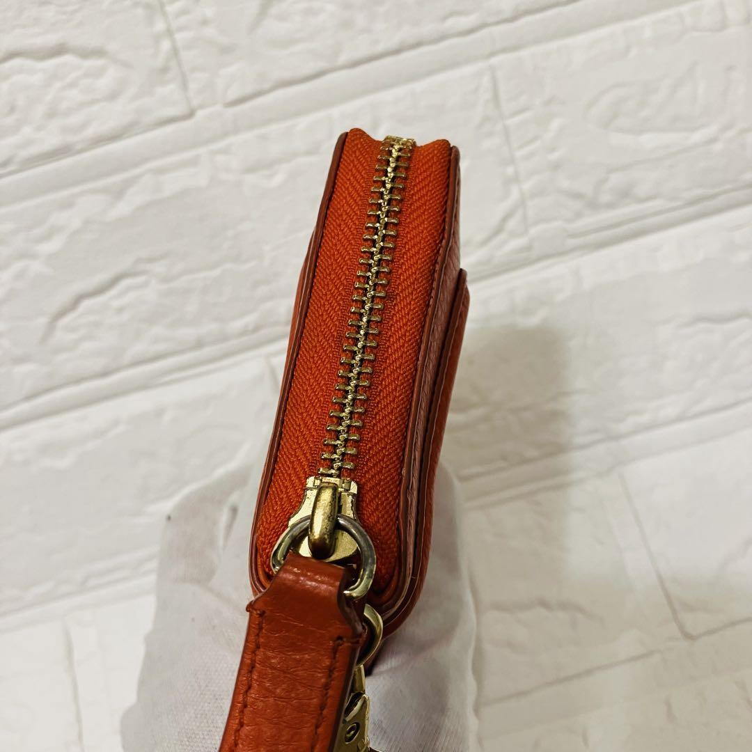 TORY BURCH 財布 オレンジ 可愛い - メルカリ