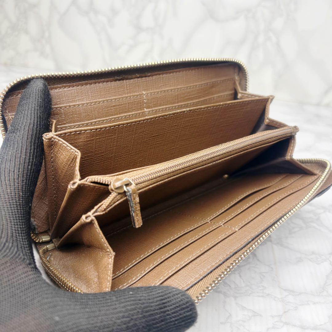 56 美品 GUCCI 長財布 PVC ラウンドファスナー nd2