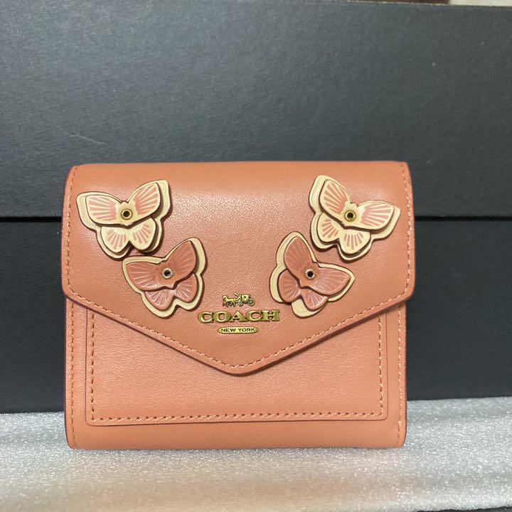 41%割引オレンジ系【予約販売品】 COACH コーチ 三つ折り財布