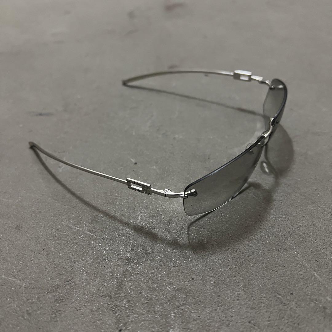 小物 GUCCI linestone rimless sunglasses