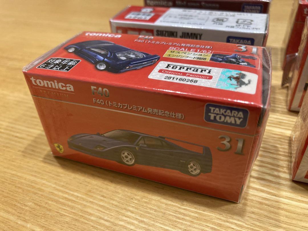 トミカプレミアム　通常　初回発売記念仕様　クリアケース付き　まとめ売り トミカ 初回限定まとめ売り シュリンク付き - メルカリ