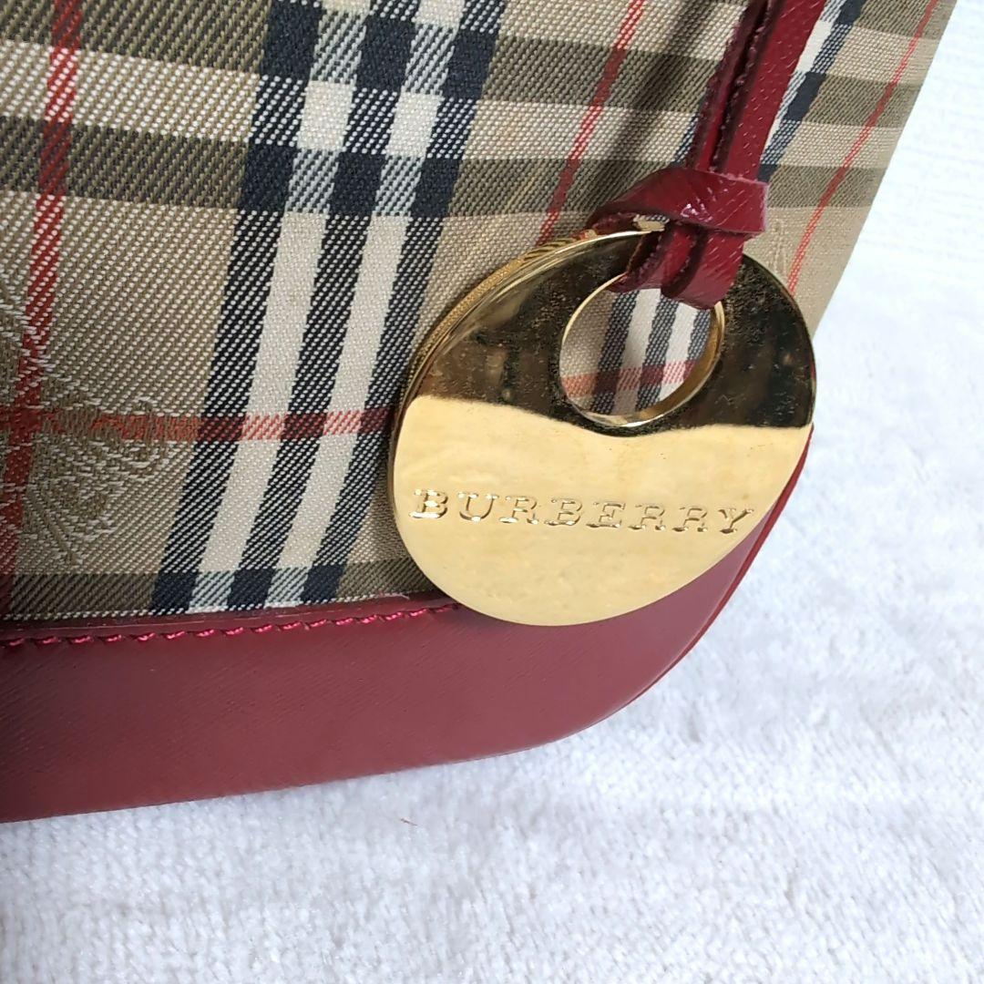dh22 BURBERRY ハンドバッグ 金チャーム ノバチェック 赤