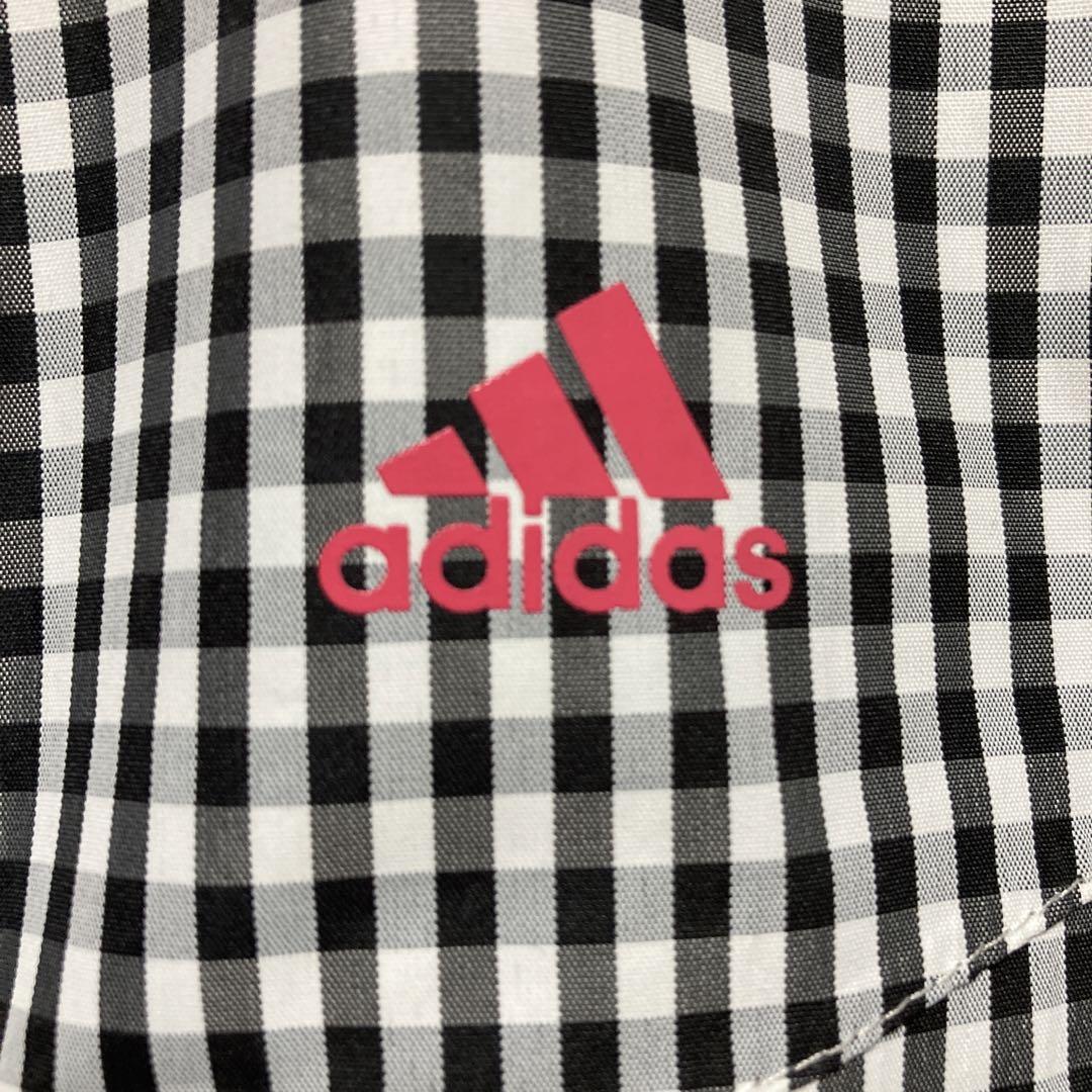 adidasゴルフ　チェック レインウェア XS