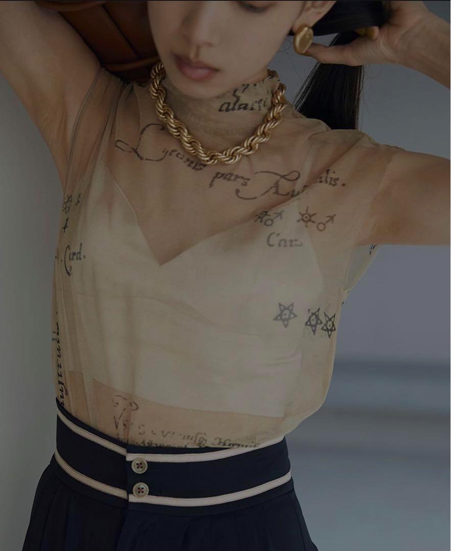 AMERI HOROSCOPE SKIN TOP