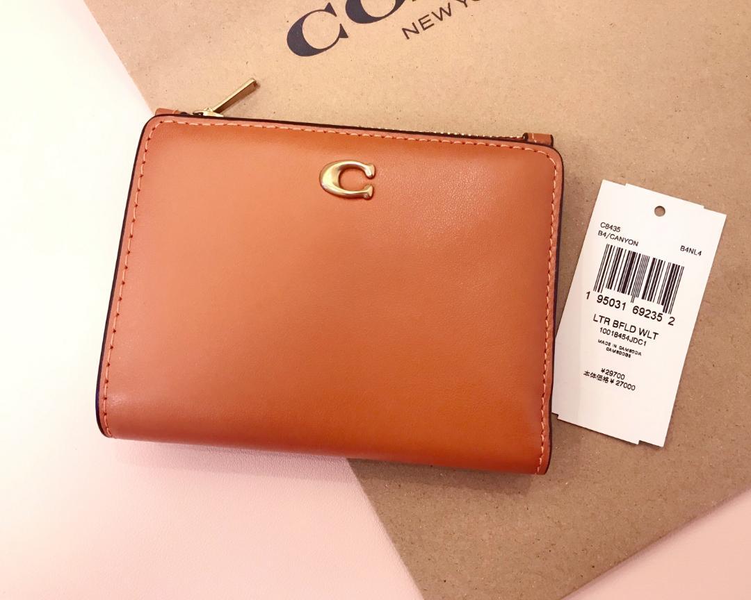 ひまわり☆ 新品coach バイフォールド スナップ ウォレット