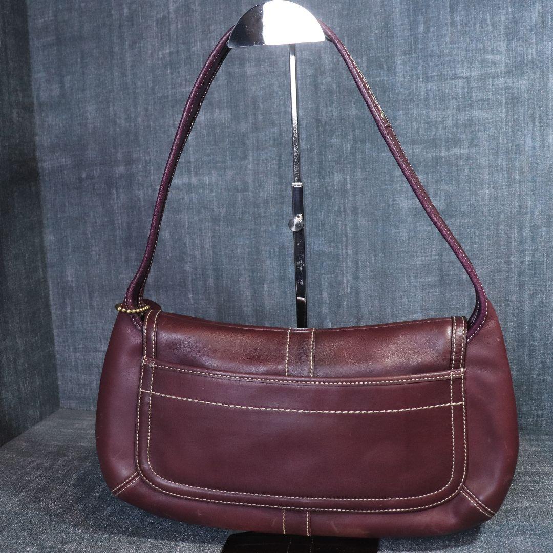 安い割引 COACH アクセサリーポーチ オールレザー ゴールド金具 紫 バッグ