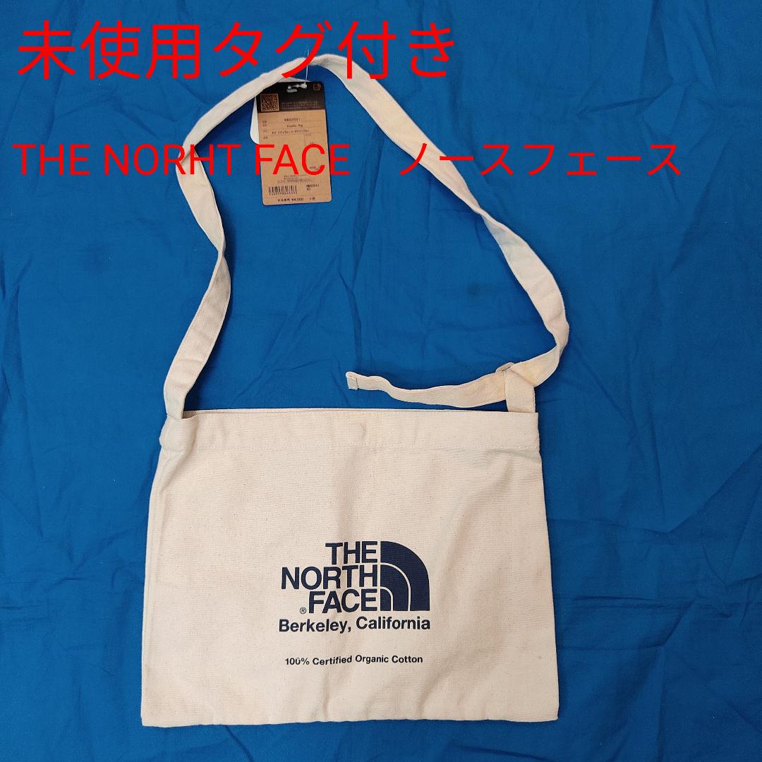 新品未使用タグ付き　紙袋付き　ノースフェイスショルダーバック 未使用タグ付き ノースフェイス ショルダーバッグ 10L 青