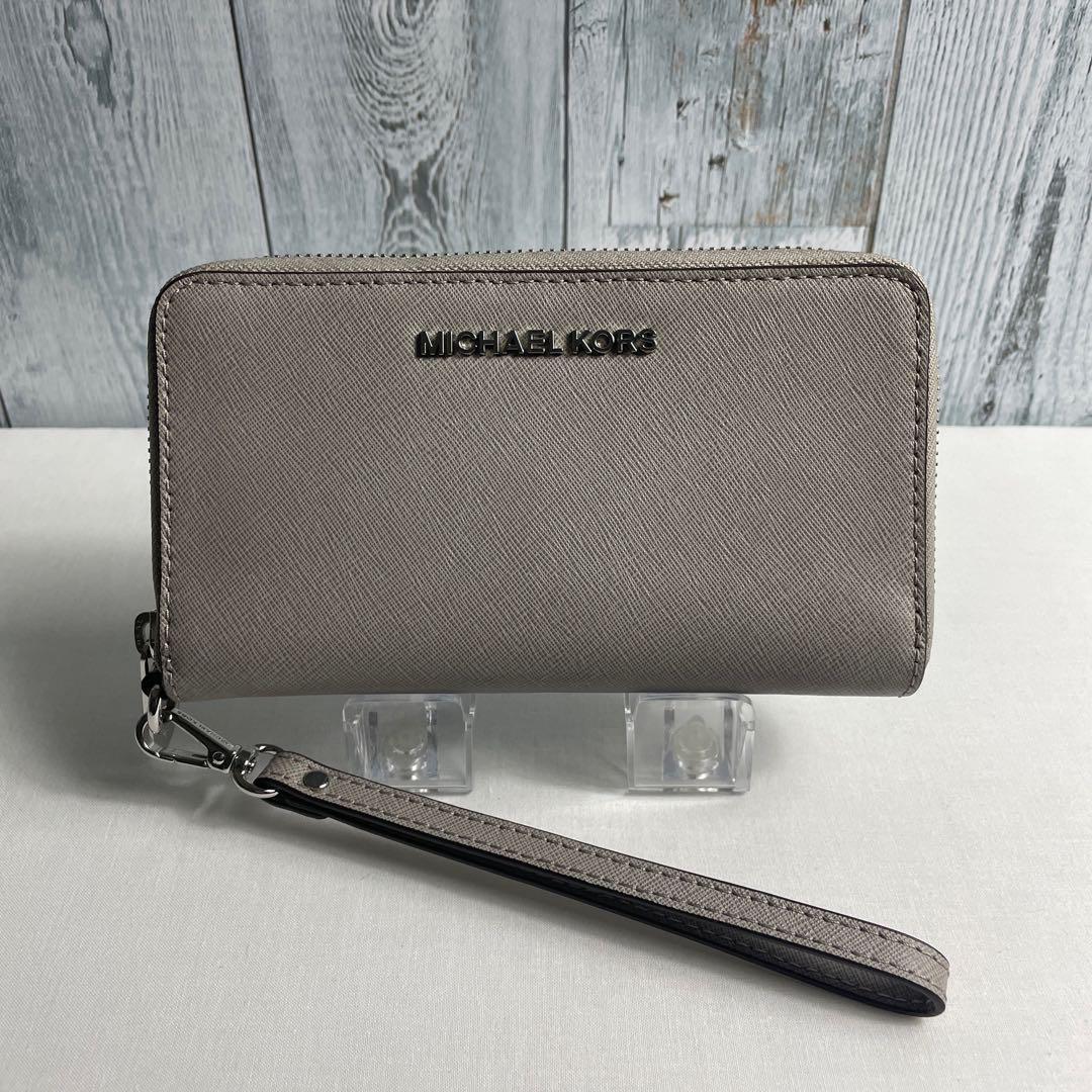 祝開店！大放出セール開催中 新品】マイケルコースMichael Kors 長財布 グレージュ ジッピー 小物