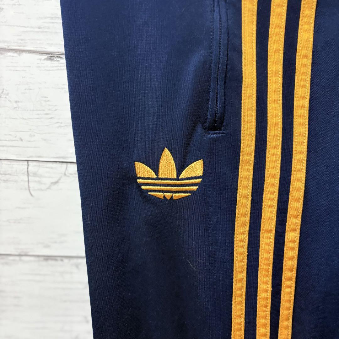 adidas トラックパンツ メンズ L パンツ ネイビー/オレンジ