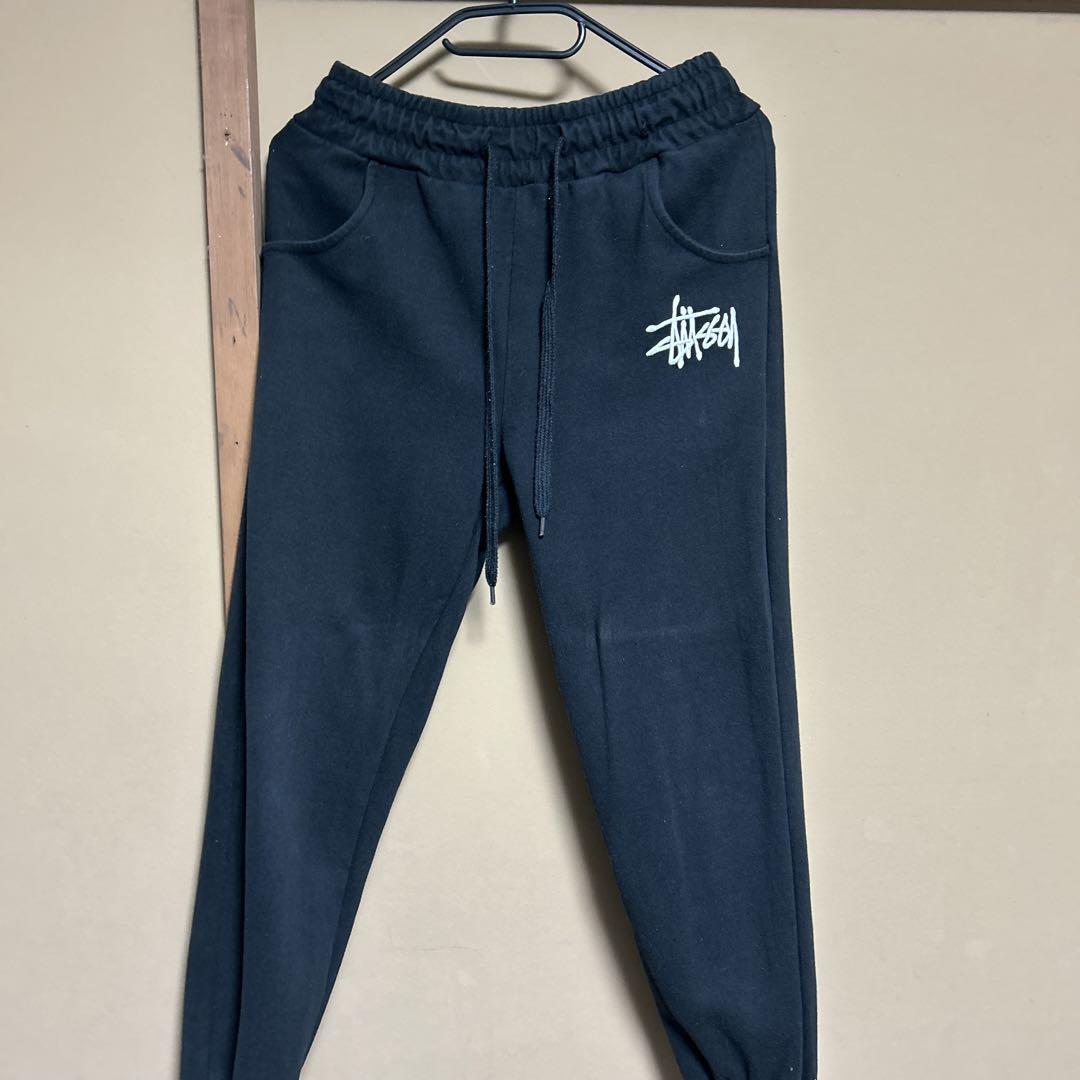 Stussy ブラック スウェットパンツ