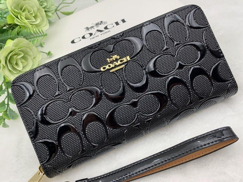 COACH ブラック 長財布 エンボス加工