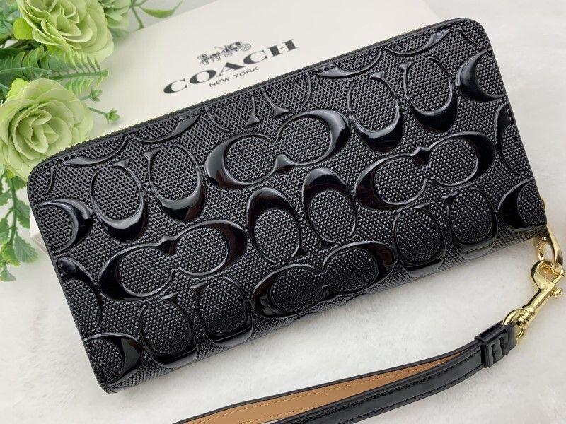 【新品未使用】COACH 長財布 ブラック エンボス加工 ラウンドファスナー
