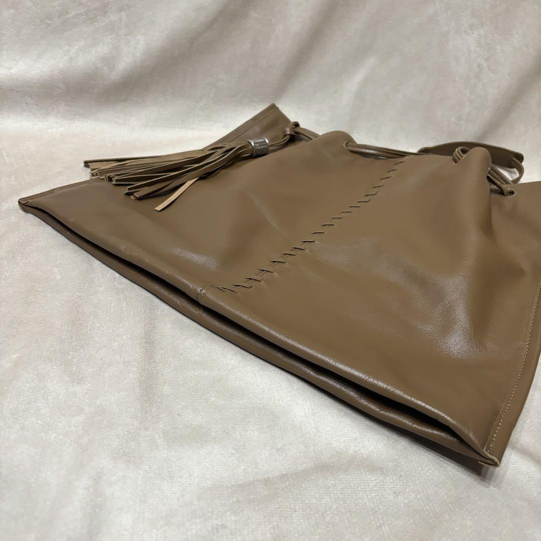 ear PAPILLONNER イアパピヨネ ロングタッセル巾着トートバッグ
