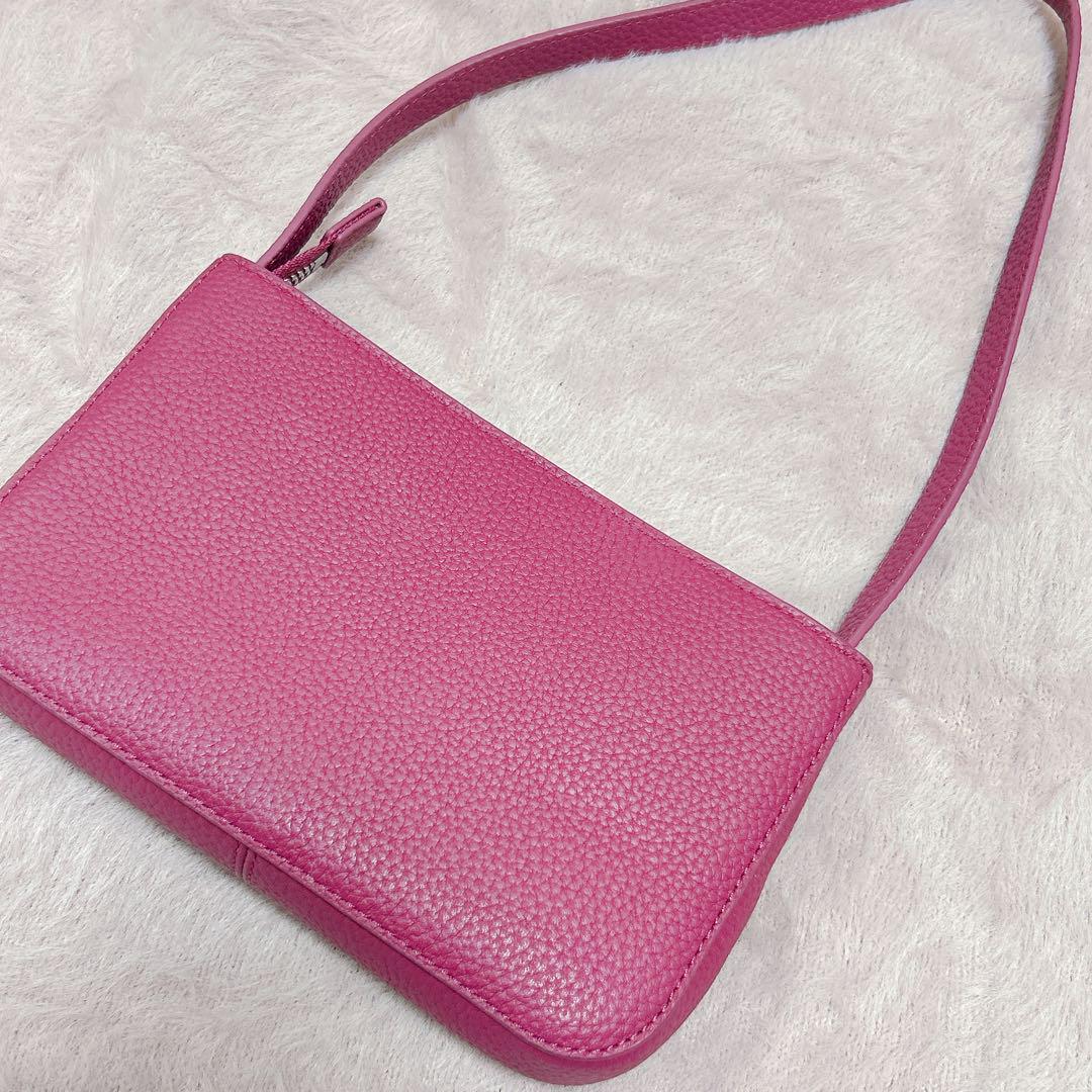 LACOSTE ピンク クラッチバッグ