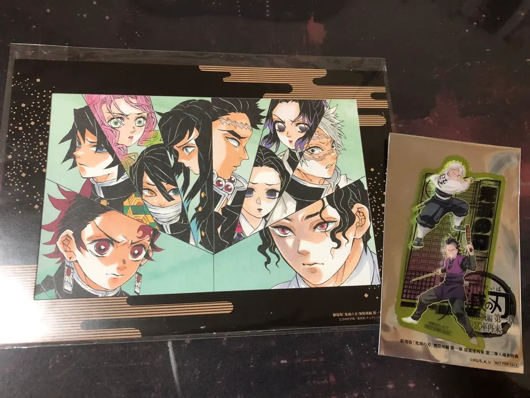 Thumbnail of Demon Slayer: Kimetsu no Yaiba - Swordsmith Village Arc: Akaza's Return - Theater-goer Bonus (Special Art Stand, Clear Sheet)