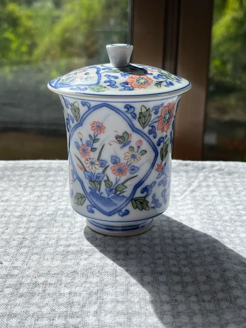 Thumbnail of Yazaemon Arita-yaki (Arita ware) floral pattern lidded teacup, approximately 10cm tall