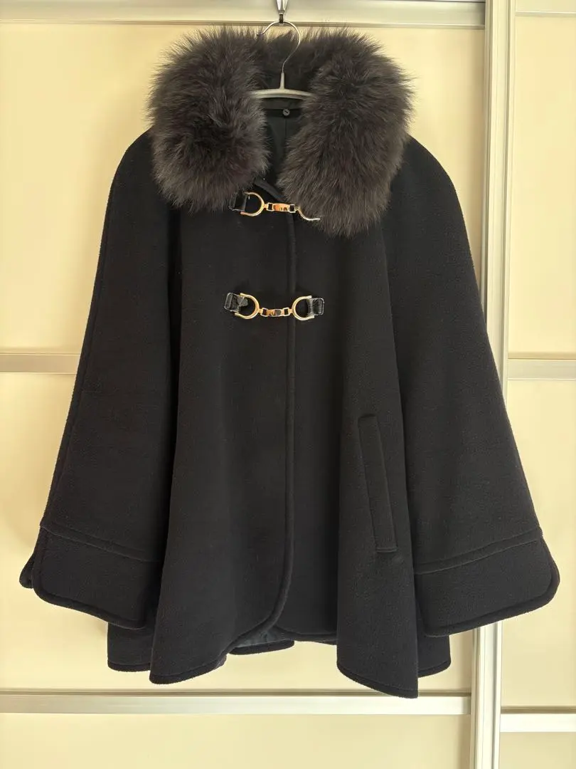 Thumbnail of Black fur poncho
