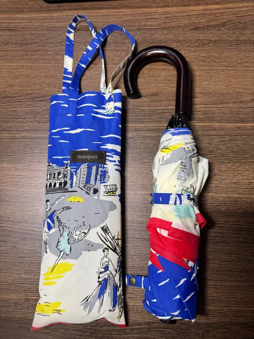 【新品】manipuri 折りたたみ傘 carnival  カーニバル　ブルー 新品】manipuri 折りたたみ傘 carnival カーニバルブルー