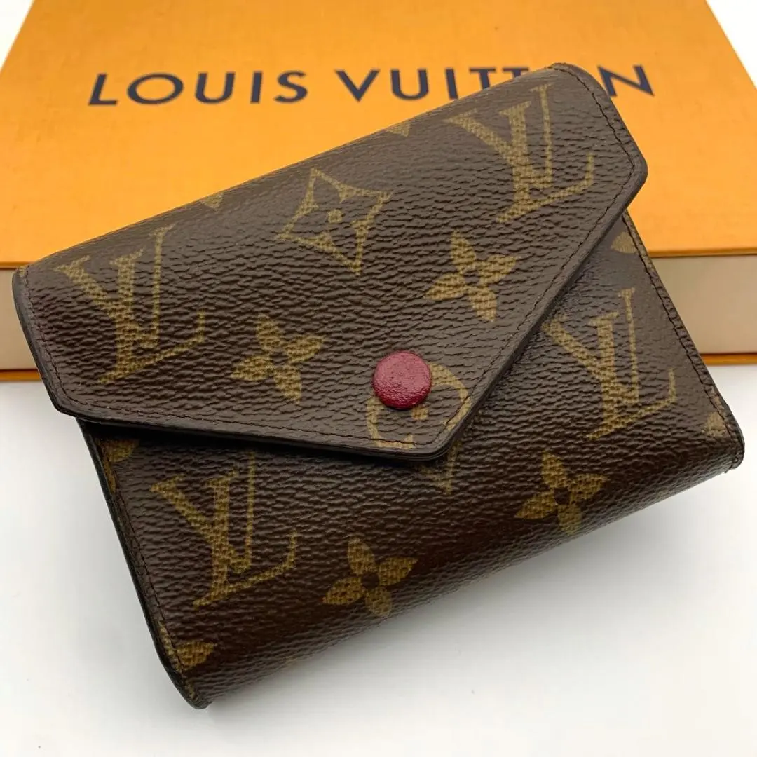 Thumbnail of Excellent condition Louis Vuitton Portefeuille Victorine compact wallet in Fuchsia