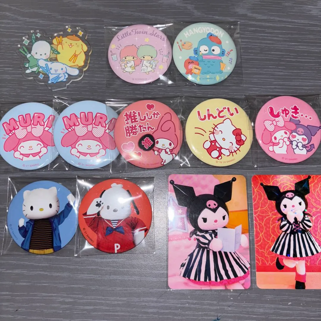 Thumbnail of Sanrio tin badges, acrylic stands, trading cards
