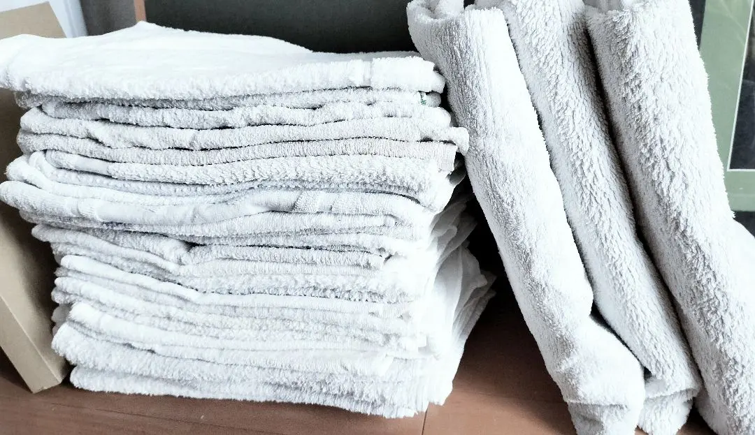 Thumbnail of 33 used face towels for Wes, 3 large bath towels