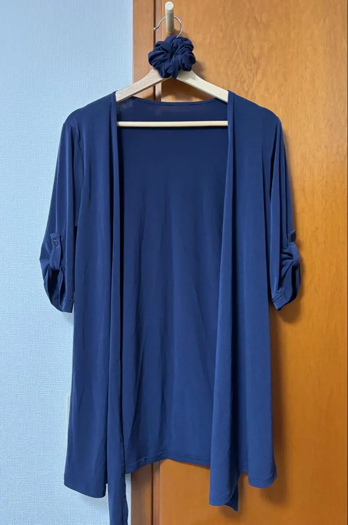 Thumbnail of Three-quarter sleeve topper cardigan made in Indonesia, with a matching scrunchie.