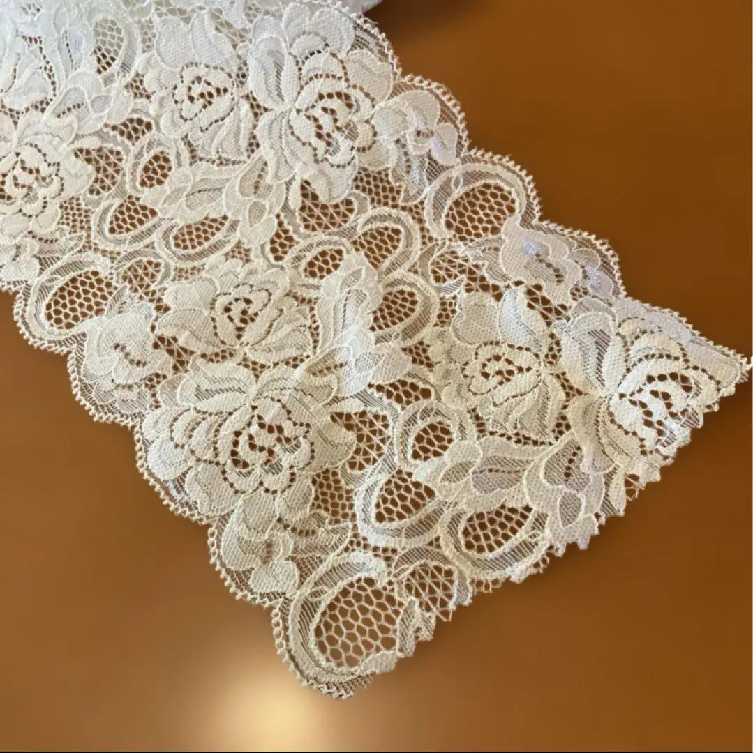 Thumbnail of Sold by the meter: 13cm wide ivory floral lace. Length adjustments available.